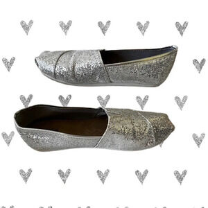 Faded Glory slip on shoes.  Silver sparkles.  Size 7.  Excellent condition